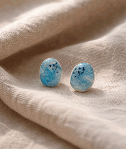 handmade_ceramic_oval_earrings_light_blue_texture_camino_inspired_jewelry