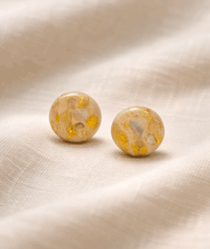 handmade_ceramic_round_earrings_warm_beige_gold_texture_camino_inspired_jewelry