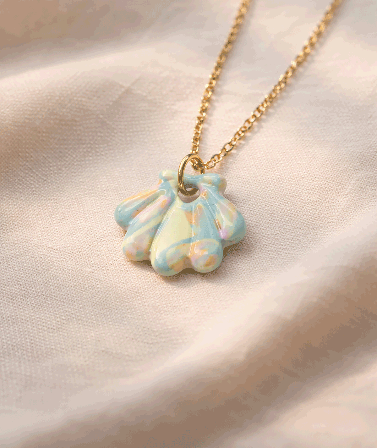 handmade_ceramic_shell_pendant_pastel_multicolor_soft_glossy_camino_inspired_necklace