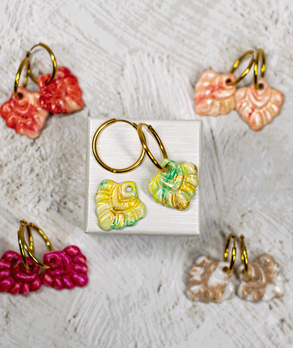 charm_06_c2 mint coral hoop earrings displayed with handmade coral-shaped earrings in pink, peach, red and beige